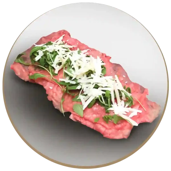 Carpaccio di bovino con rucola e grana